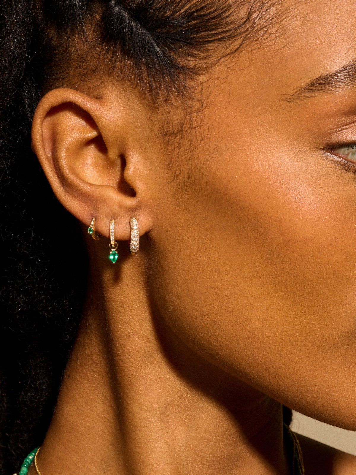 Romy Huggie Hoop Earrings | Emerald